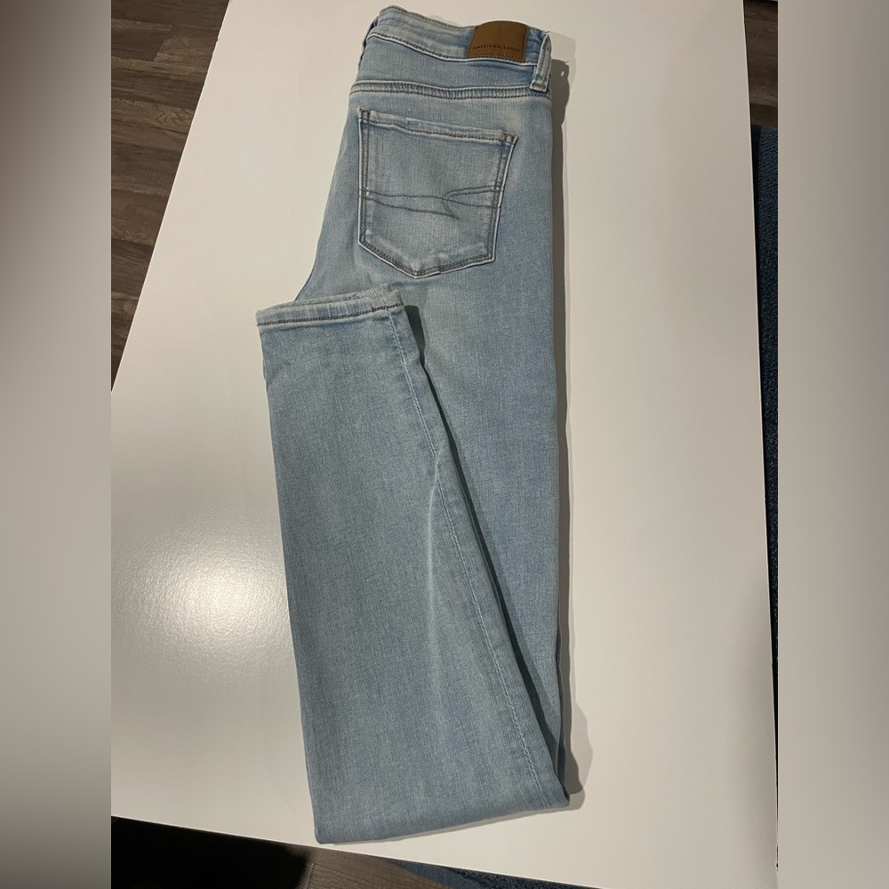 American eagle next level stretch high rise Jean in light wash size 4L 30” ins